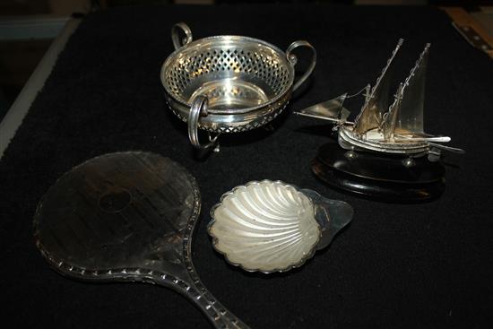 2 silver dishes and a hand mirror and a model of a boat